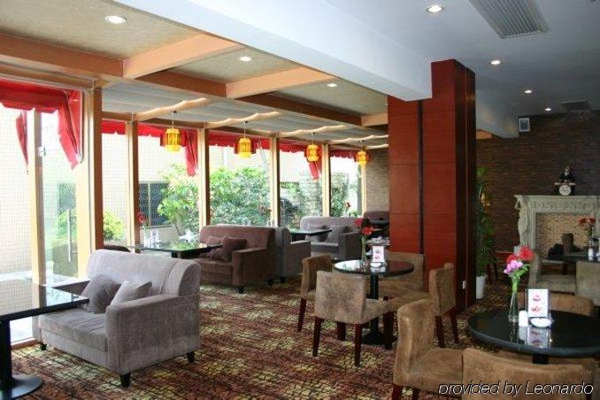 Suzhou Taoyuan International Holiday Hotel Restaurante foto