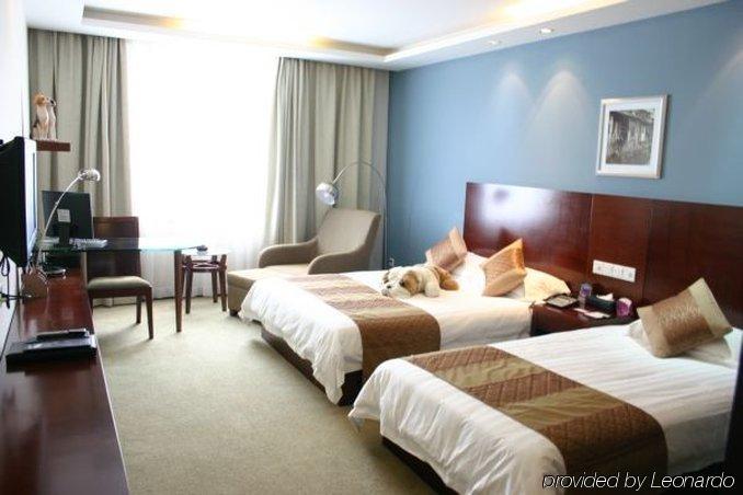 Suzhou Taoyuan International Holiday Hotel Quarto foto