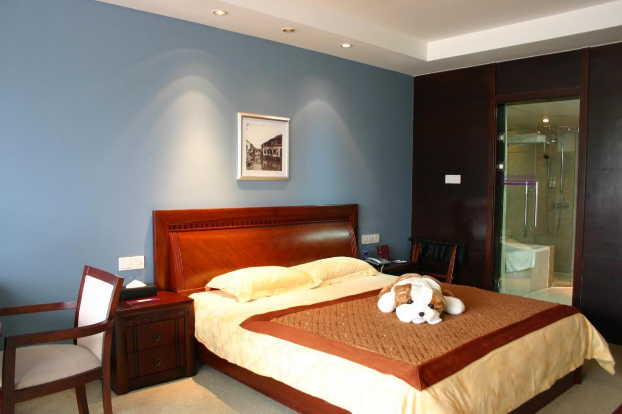 Suzhou Taoyuan International Holiday Hotel Exterior foto